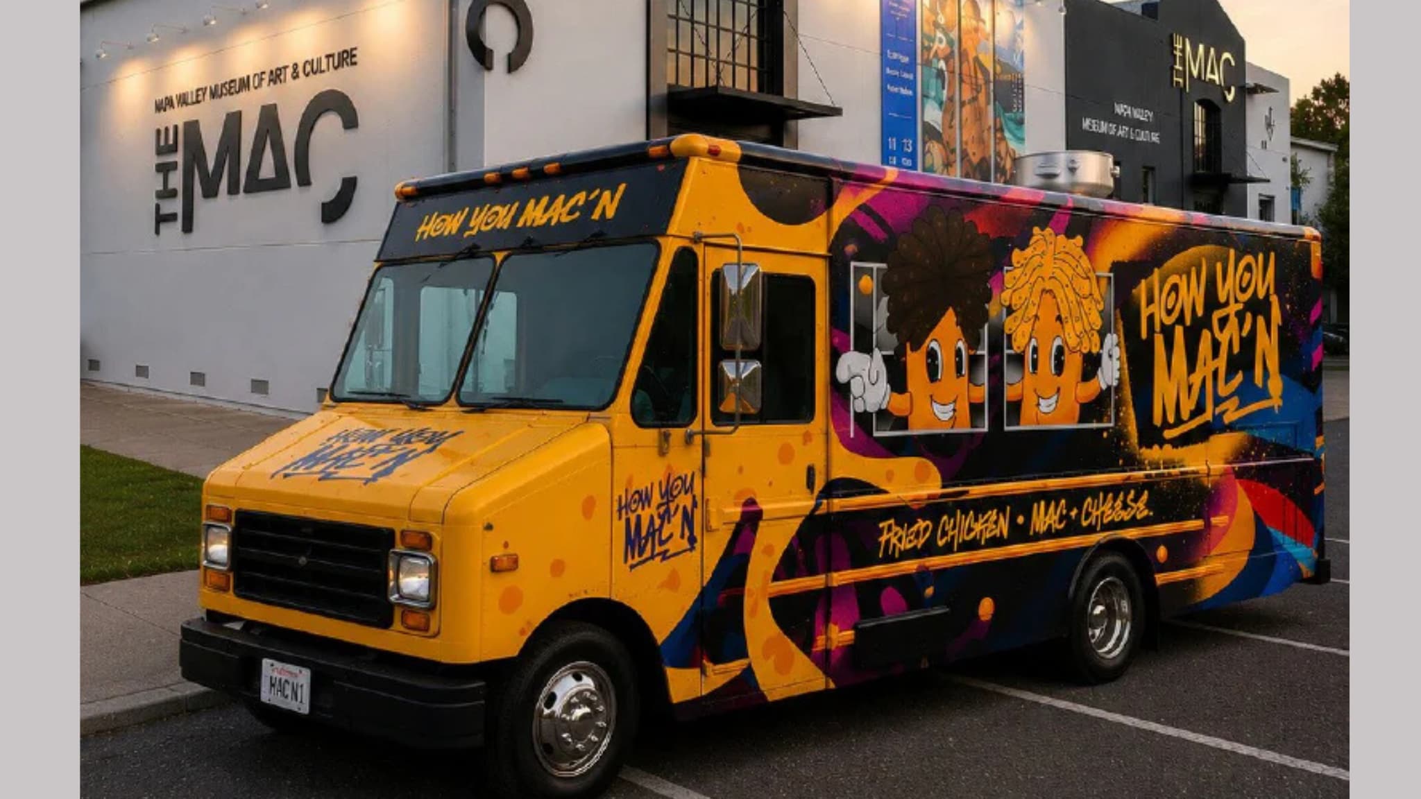 Colorful mac and cheese food truck outside museum