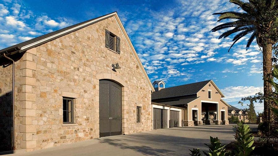 Stone building under a partly cloudy sky