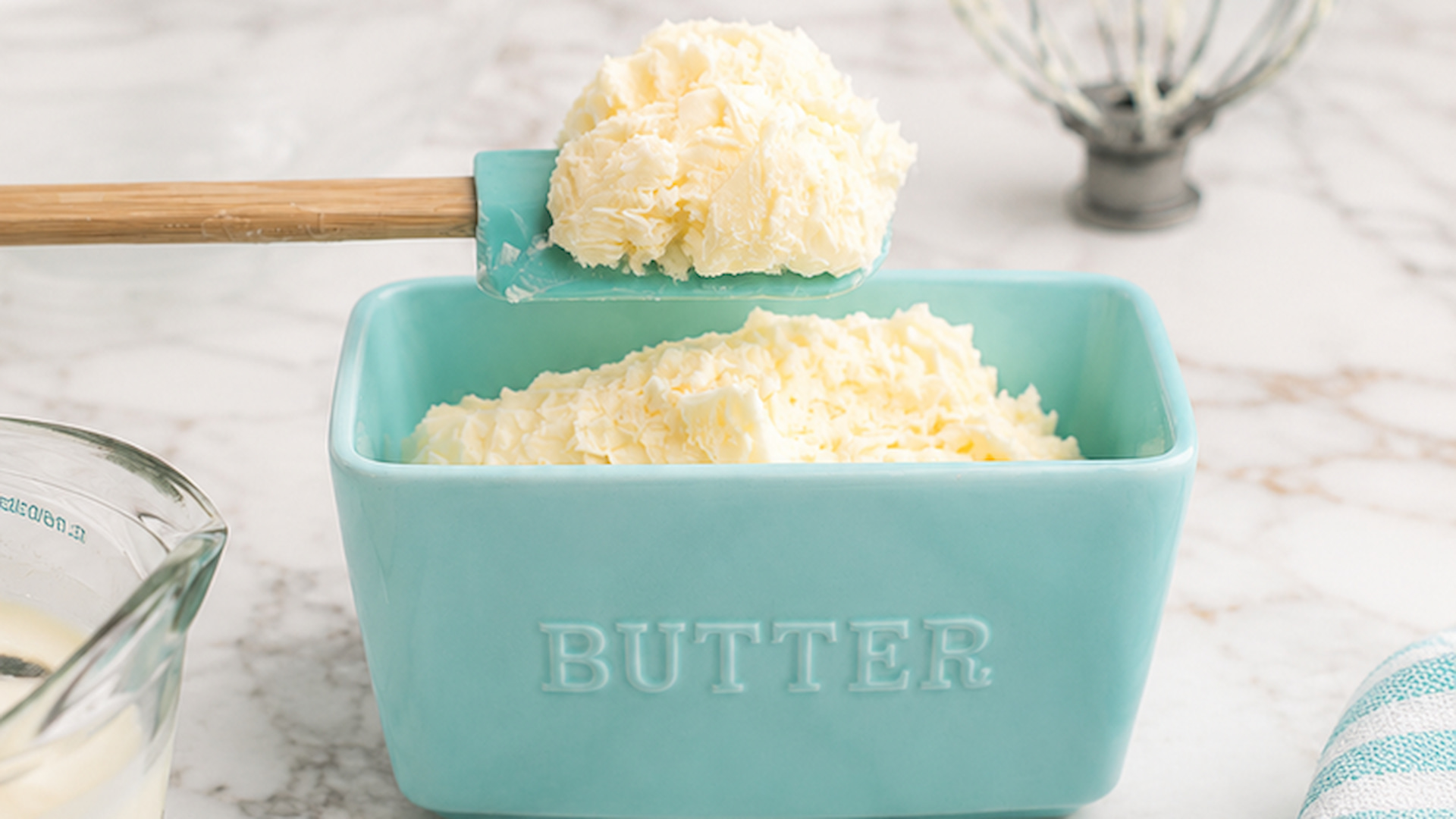 Whipped butter in teal butter dish