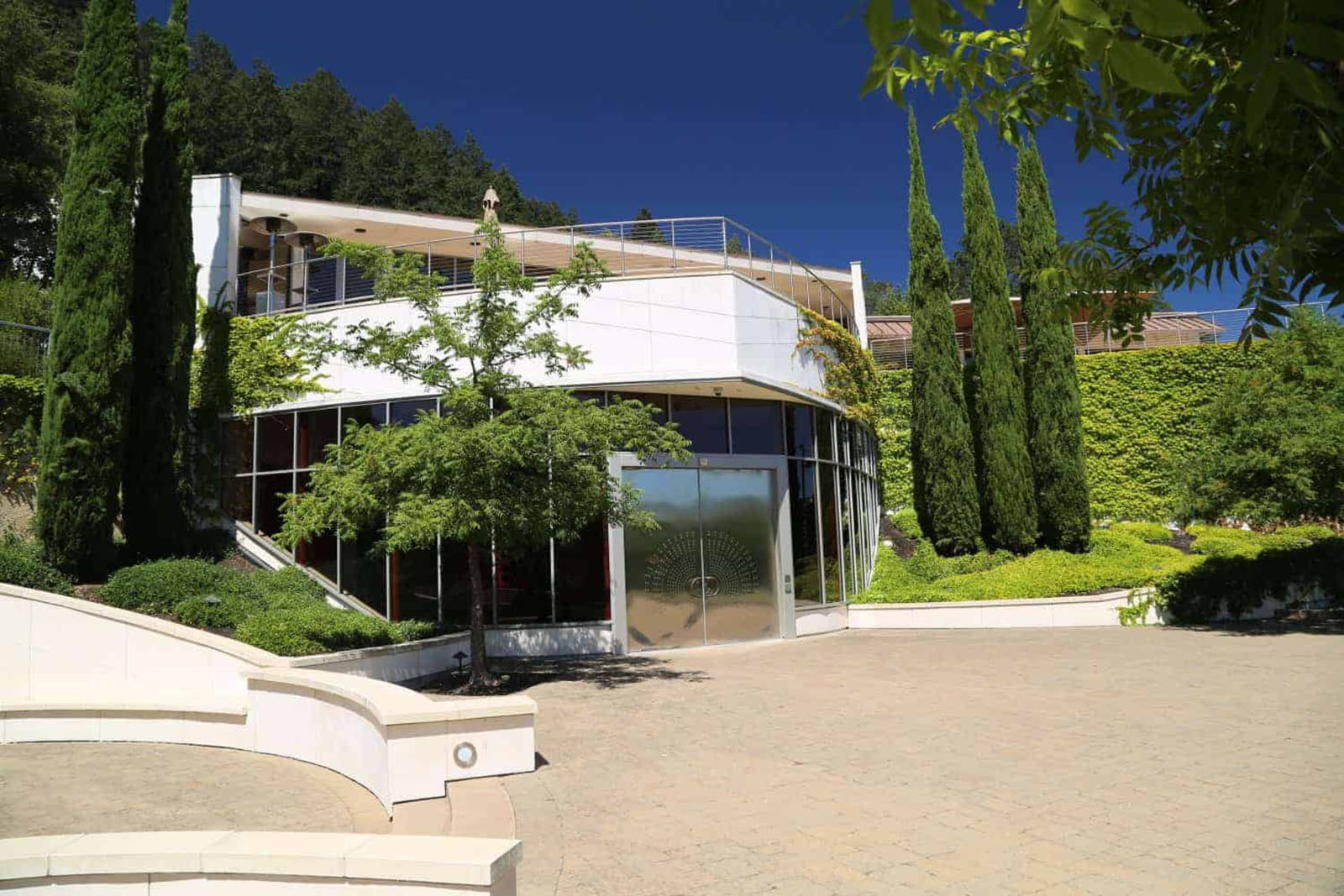 Modern building with trees and greenery