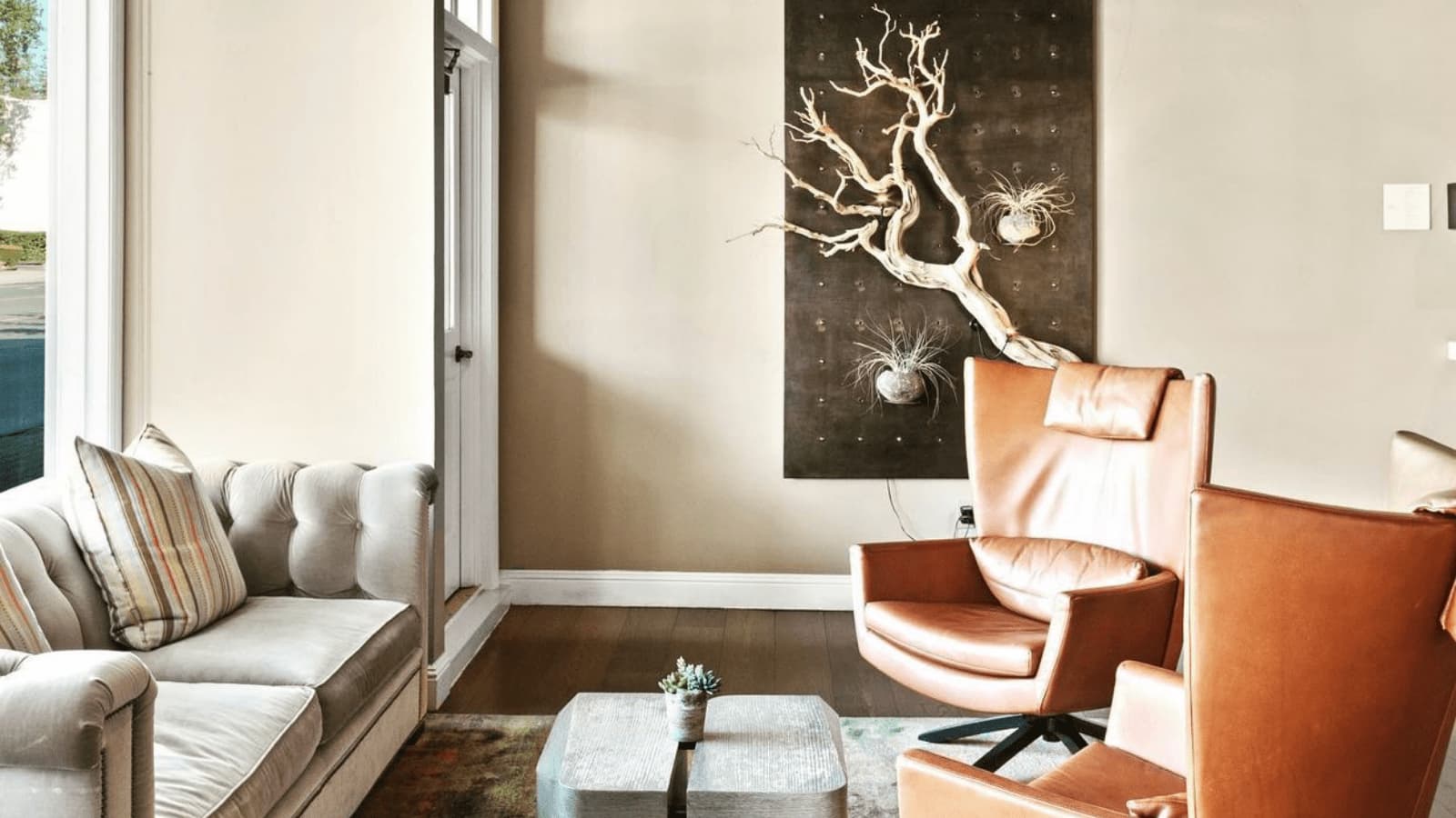 Stylish lounge with modern chairs and decor.